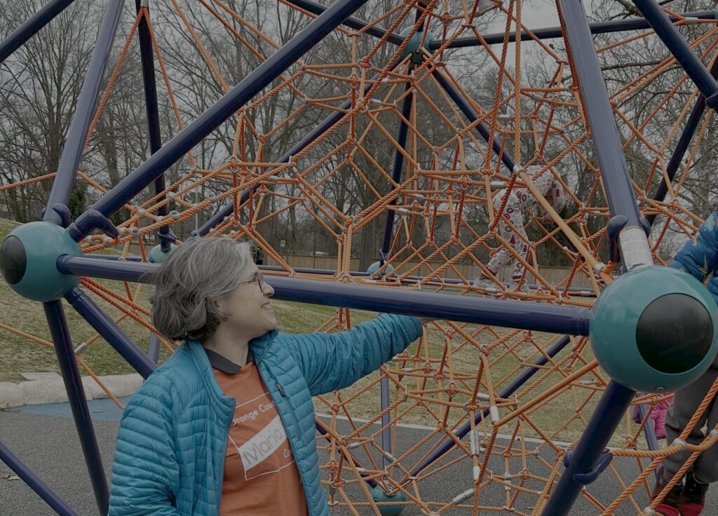 Maria on the playground at Chapel Hill Community Center
